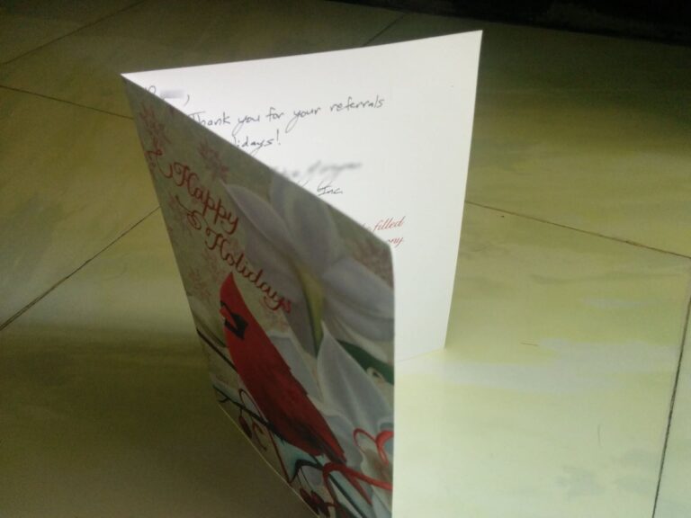 Handwritten thank-you card from the Bluehost team for referrals